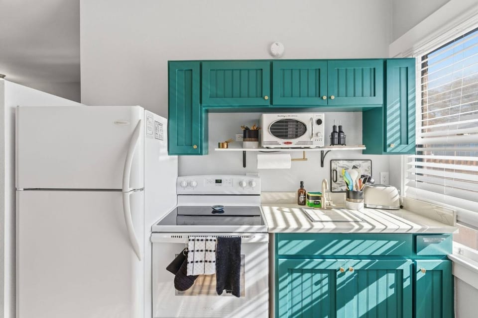 Kitchen or kitchenette, microwave, stove, kitchen