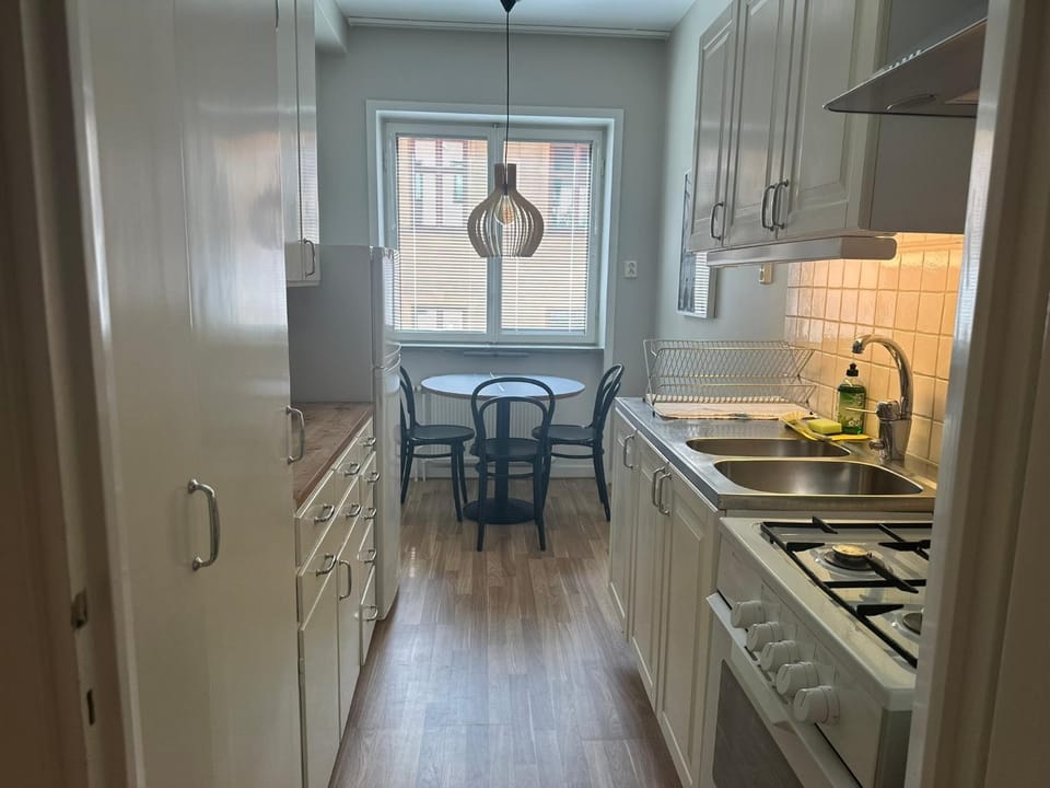 Kitchen or kitchenette, Seating area, Dining area, furniture, stove