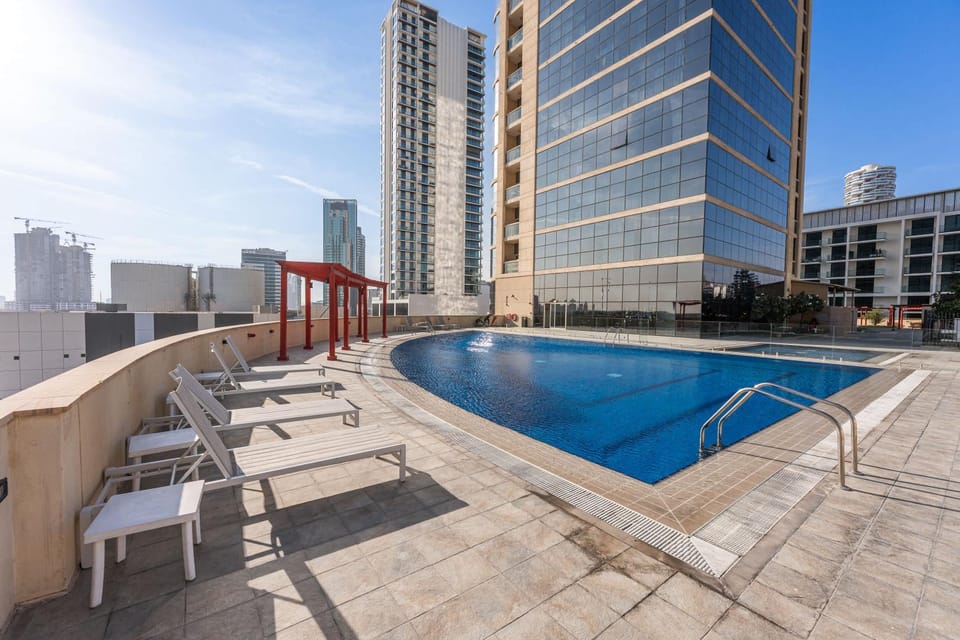 Free housekeeping visits during your stay - StayShort - Stylish 1-Bedroom Home Sleeps 4 in JVC Apartment in Dubai
