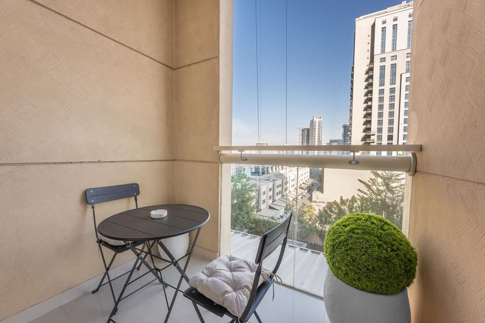 Free housekeeping visits during your stay - StayShort - Stylish 1-Bedroom Home Sleeps 4 in JVC Apartment in Dubai