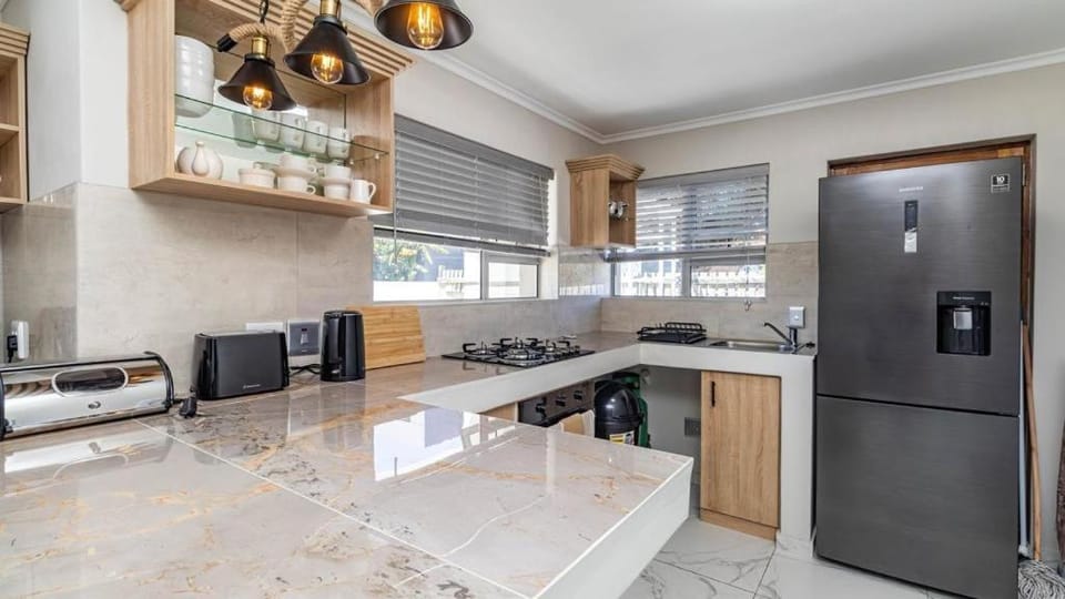 Kitchen or kitchenette, oven, stove, toaster