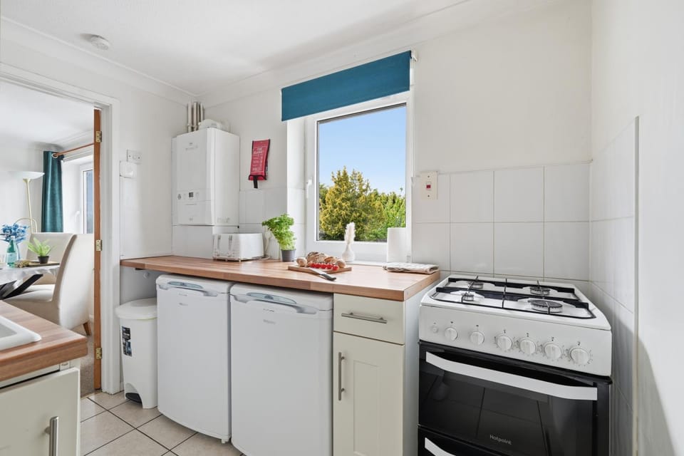 Coffee/tea facilities, Kitchen or kitchenette, Garden view, stove, toaster