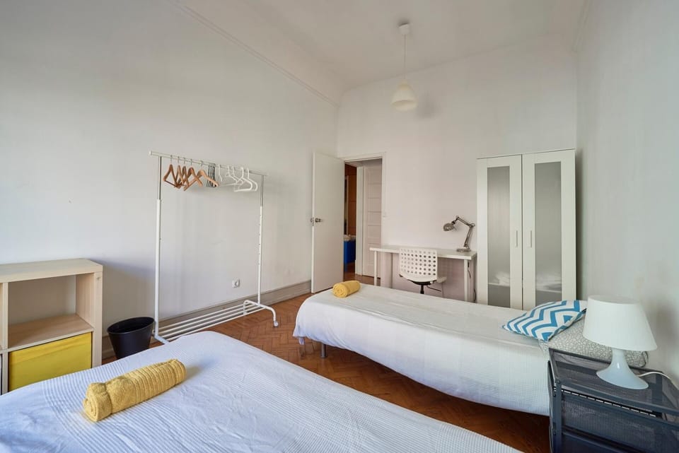 Spacious room with balcony in a Coliving apartment in Alameda Apartment in Lisbon