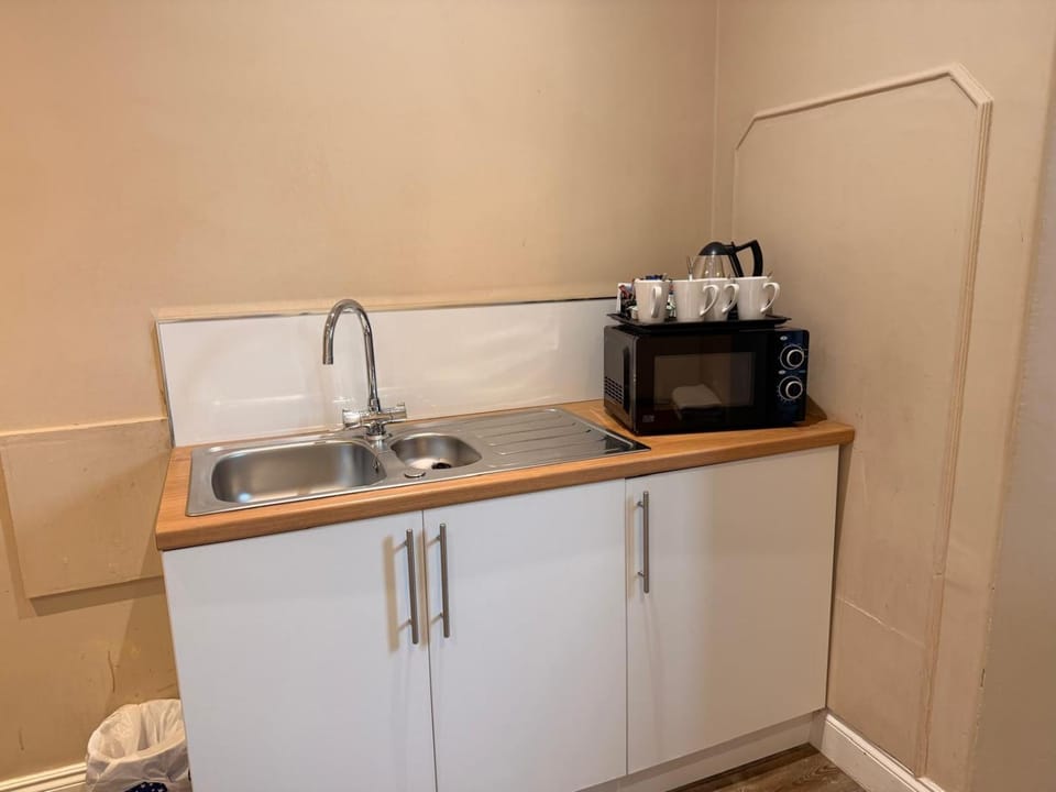 Kitchen or kitchenette, microwave