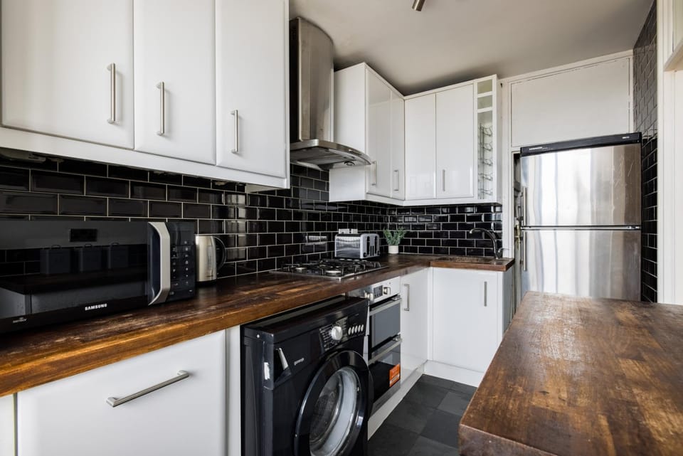 Kitchen or kitchenette, oven, toaster
