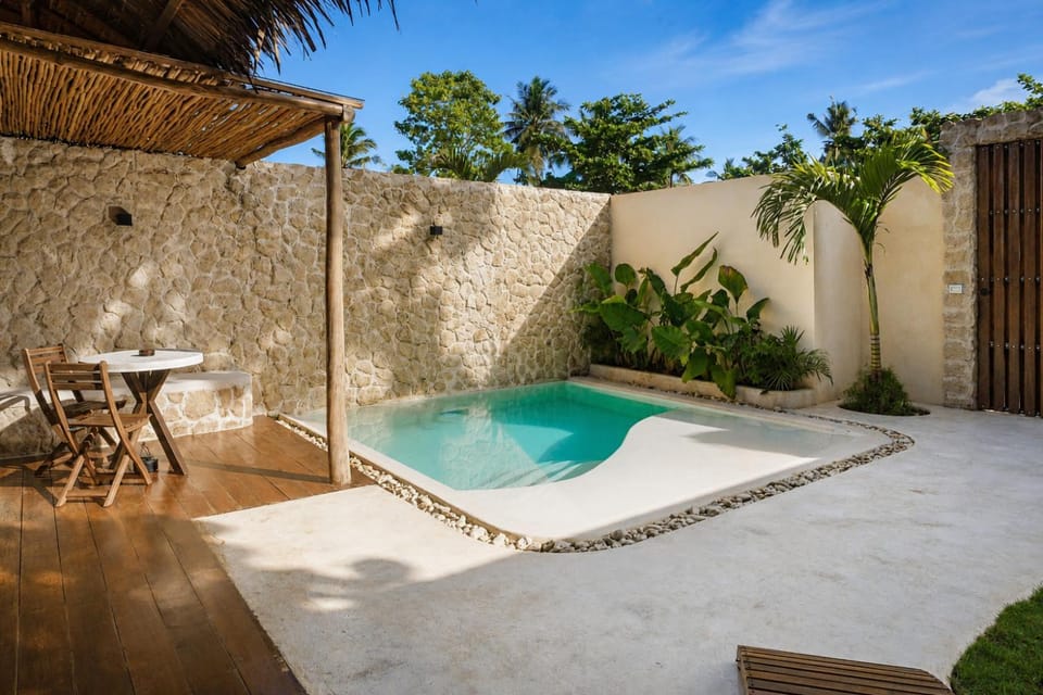 Patio, Day, Natural landscape, Pool view, Swimming pool, sunbed