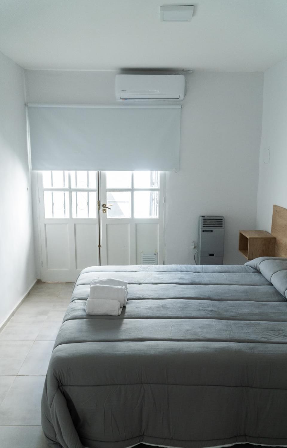 Bed, Photo of the whole room, Bedroom, towels, air conditioner
