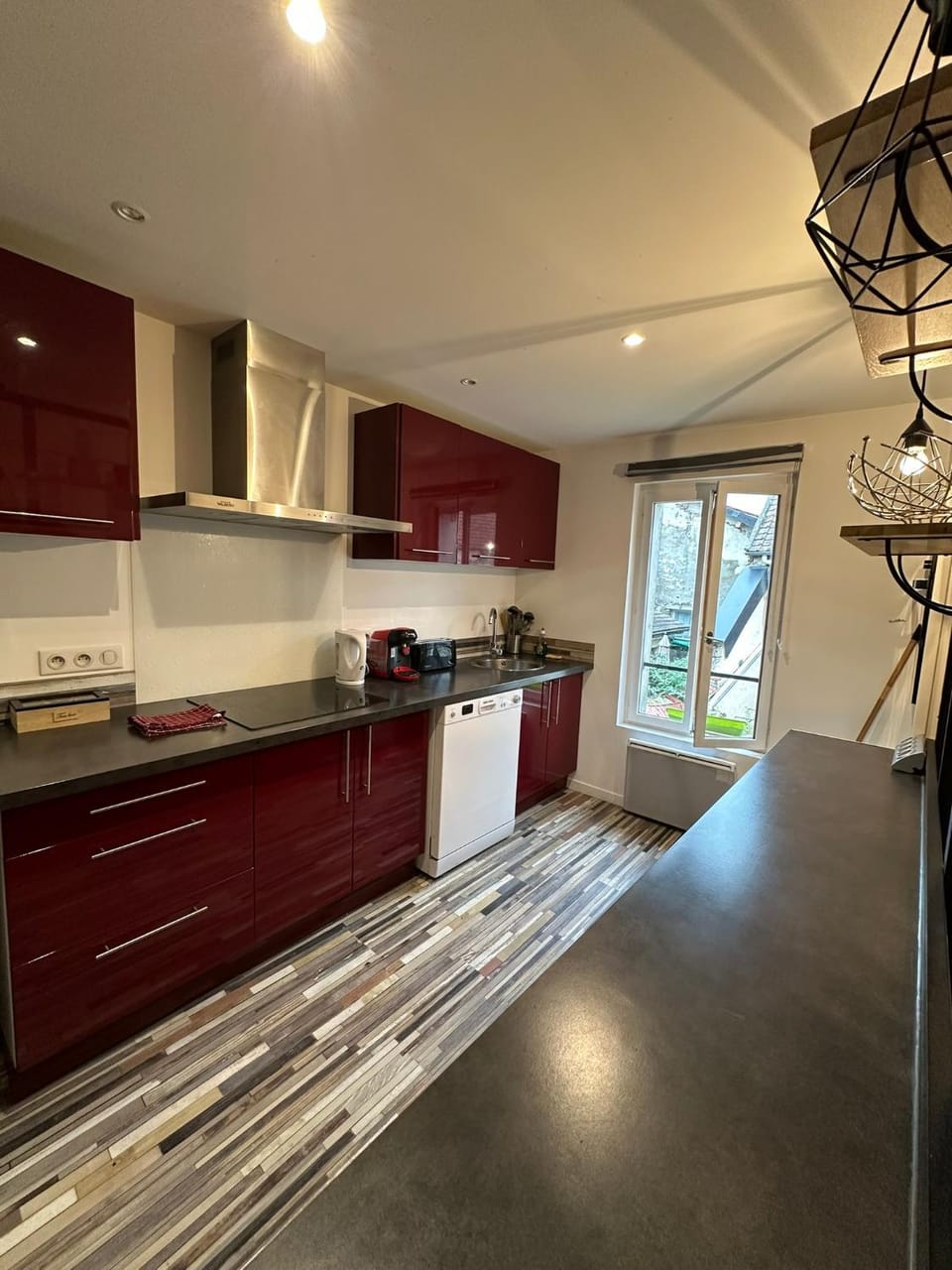 Kitchen or kitchenette, dishwasher, oven, stove, toaster