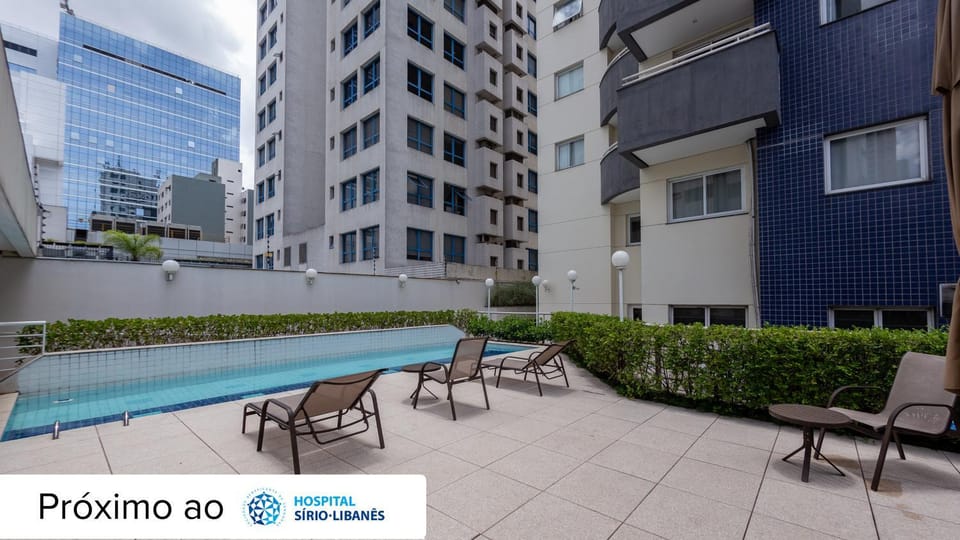 Property building, Day, Pool view, Swimming pool, sunbed