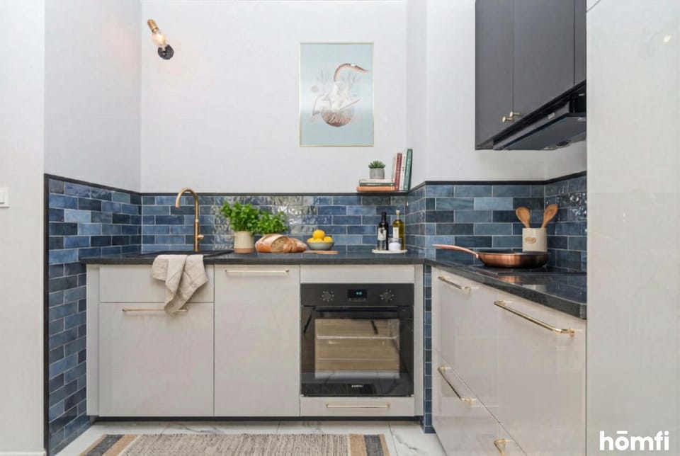Kitchen or kitchenette, dishwasher, oven, stove