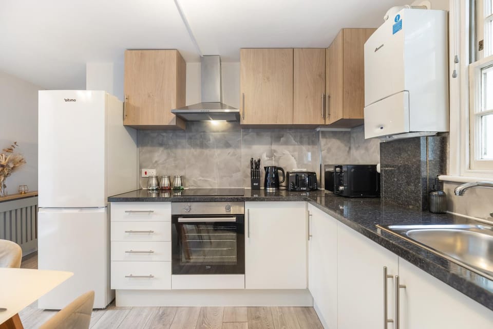 Kitchen or kitchenette, oven, stove, toaster
