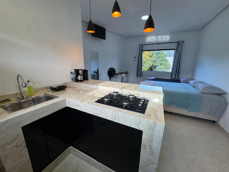 Bed, Kitchen or kitchenette, stove
