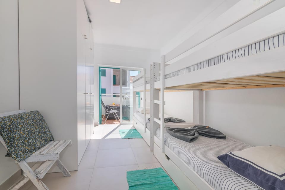 Bed, Bedroom, bunk bed, towels, wardrobe