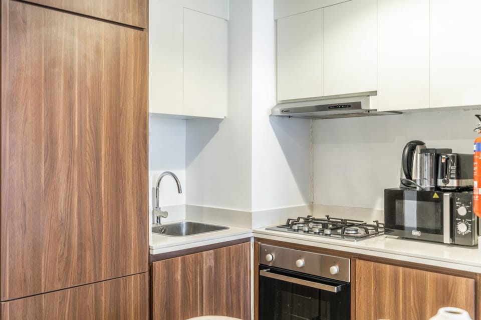 Kitchen or kitchenette, oven, stove, toaster