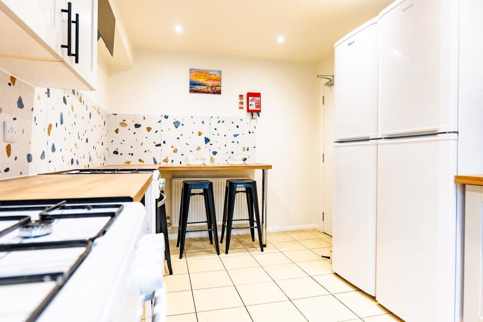 Kitchen or kitchenette, oven, stove