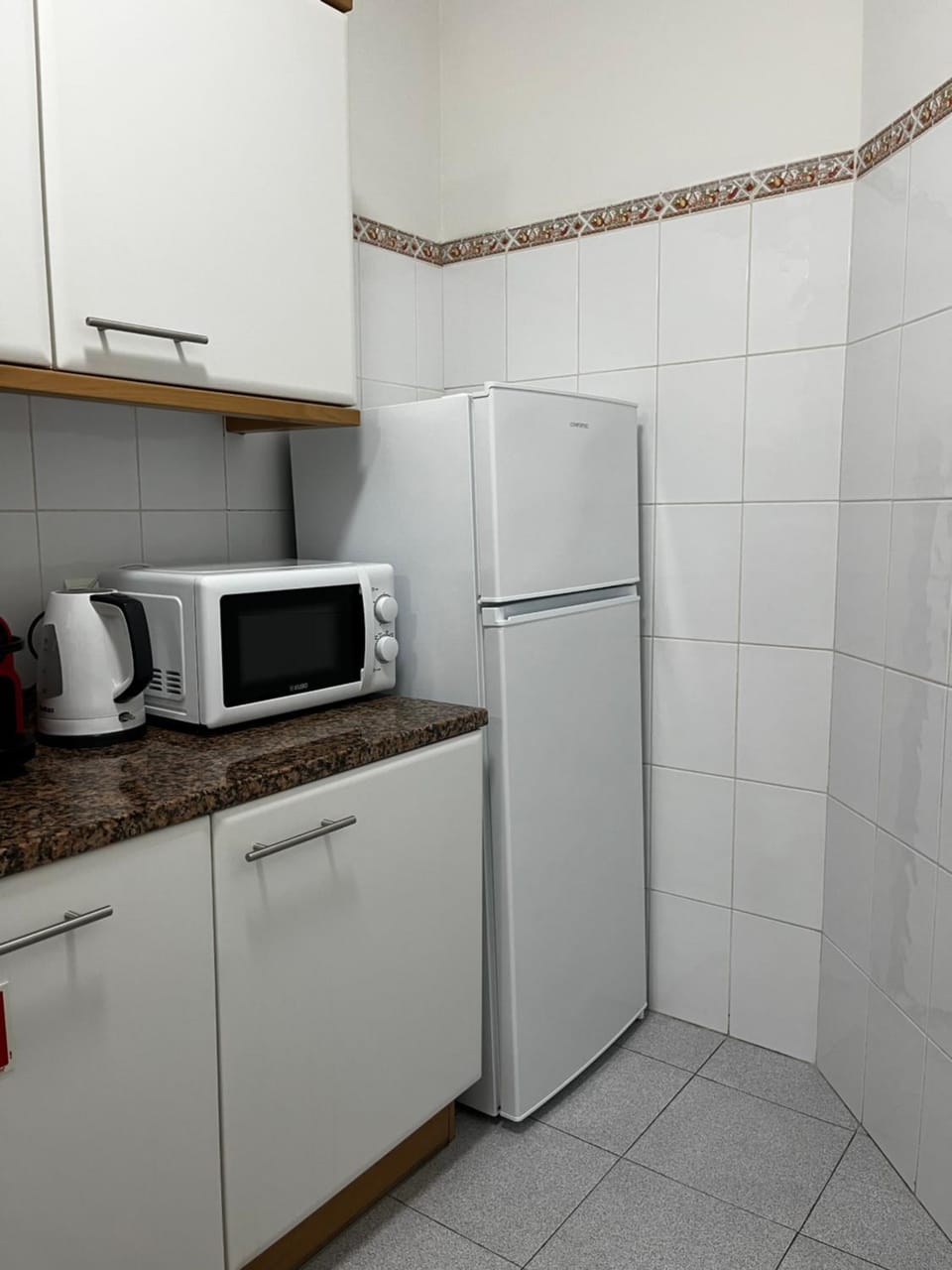Kitchen or kitchenette, microwave