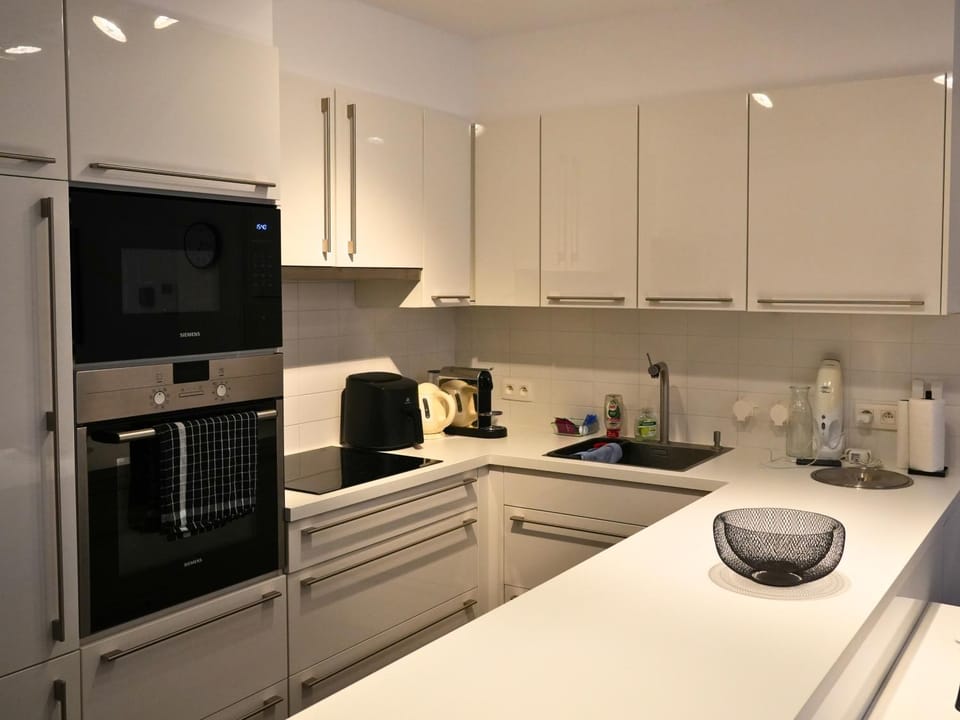 Kitchen or kitchenette, oven, stove
