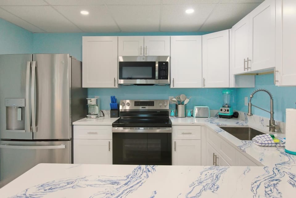 Coral Suite by Sun Palace Vacations House in Estero Island