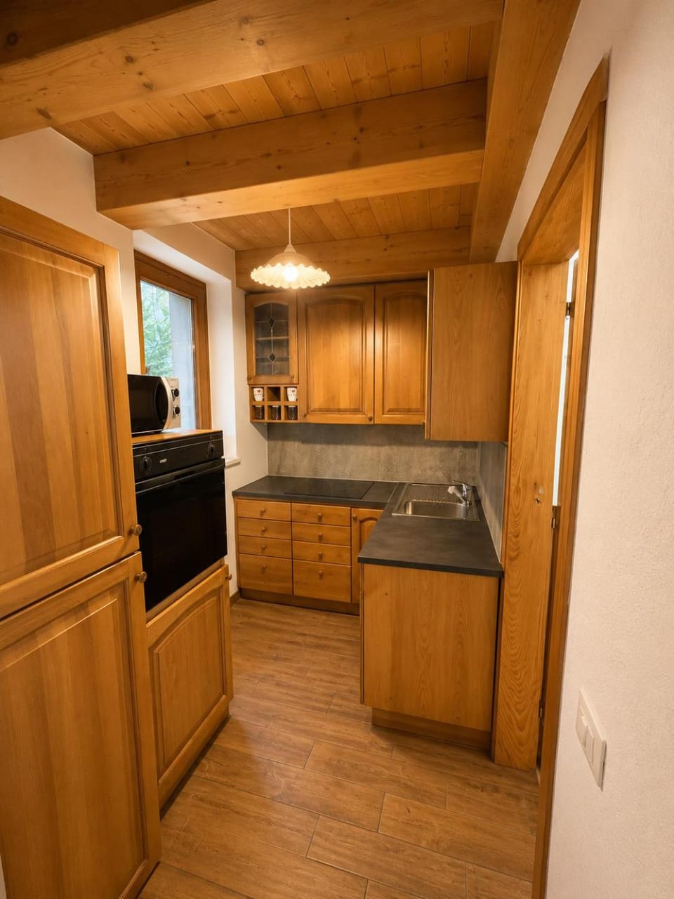 Kitchen or kitchenette, microwave, oven, stove, kitchen