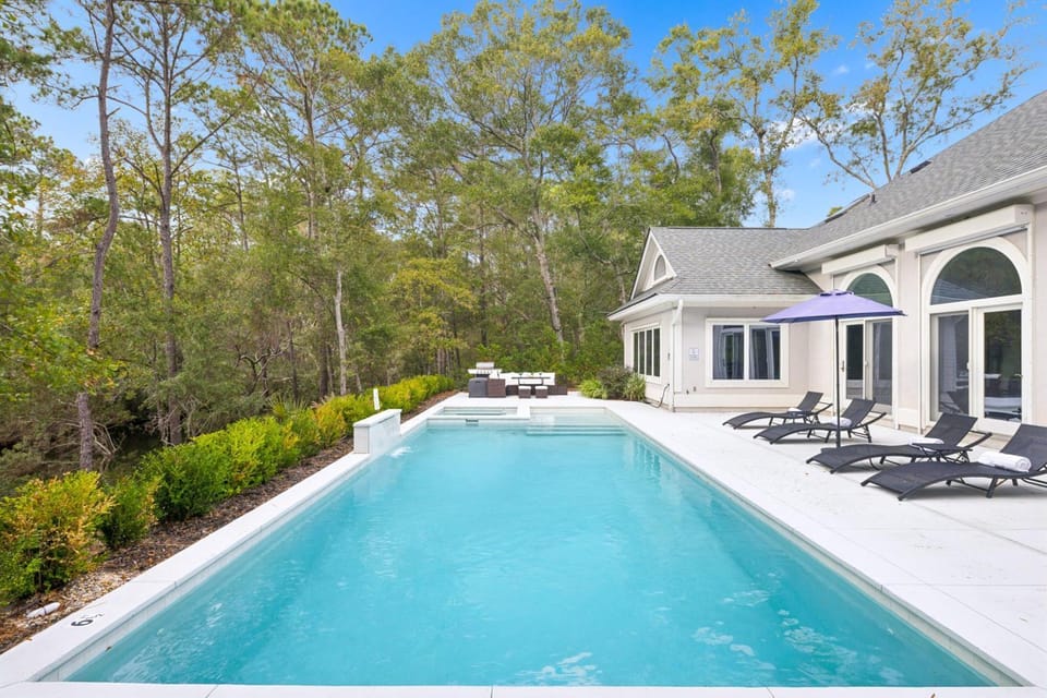 Patio, Day, Natural landscape, Pool view, Swimming pool, sunbed