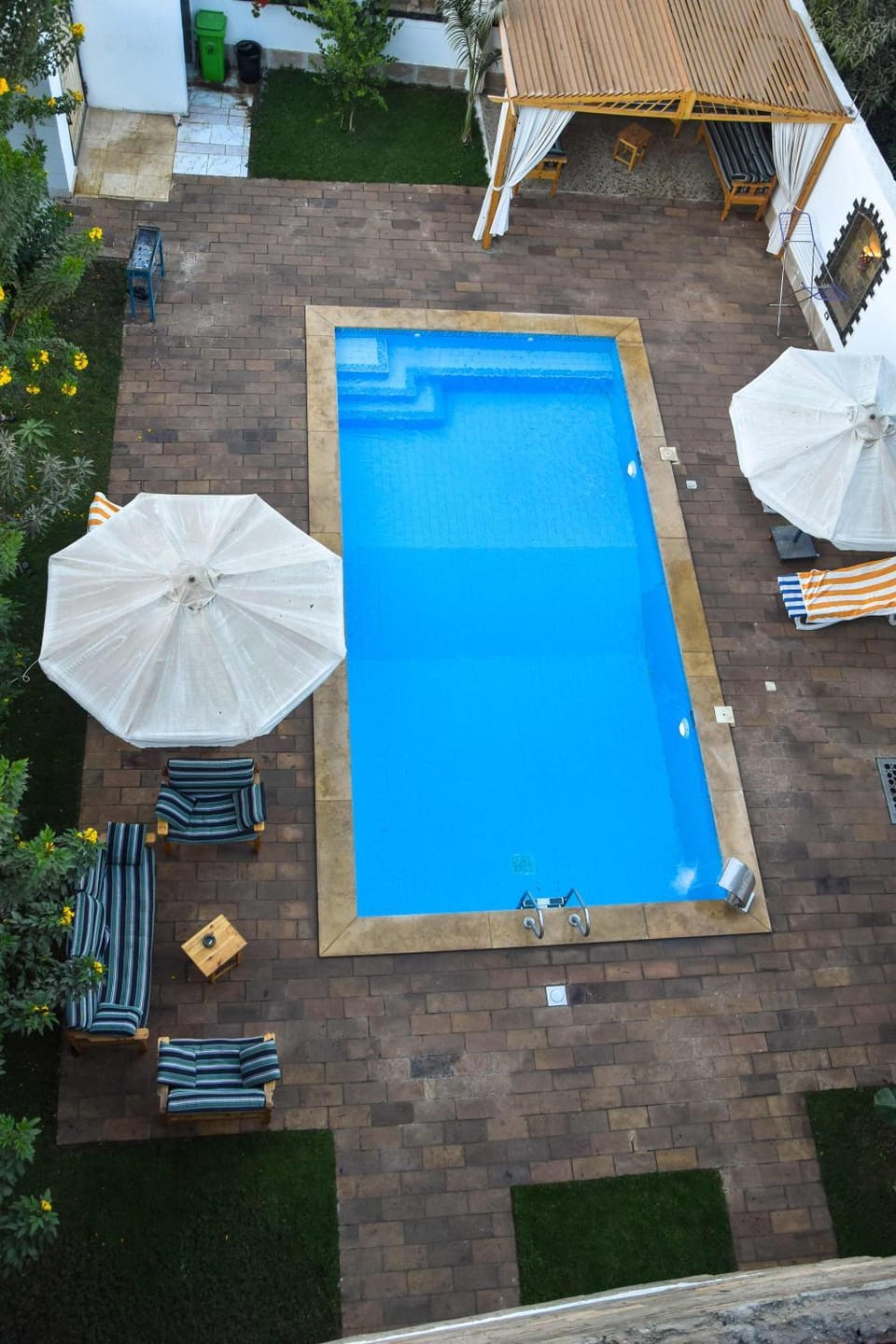Patio, Day, Pool view, Swimming pool, sunbed