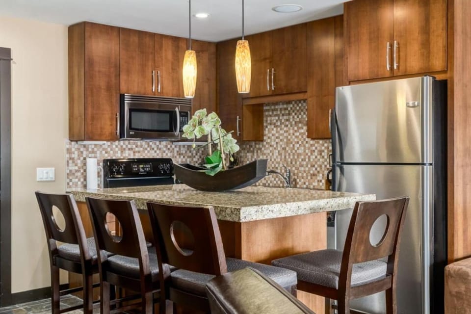 Kitchen or kitchenette, dishwasher, oven, stove, toaster