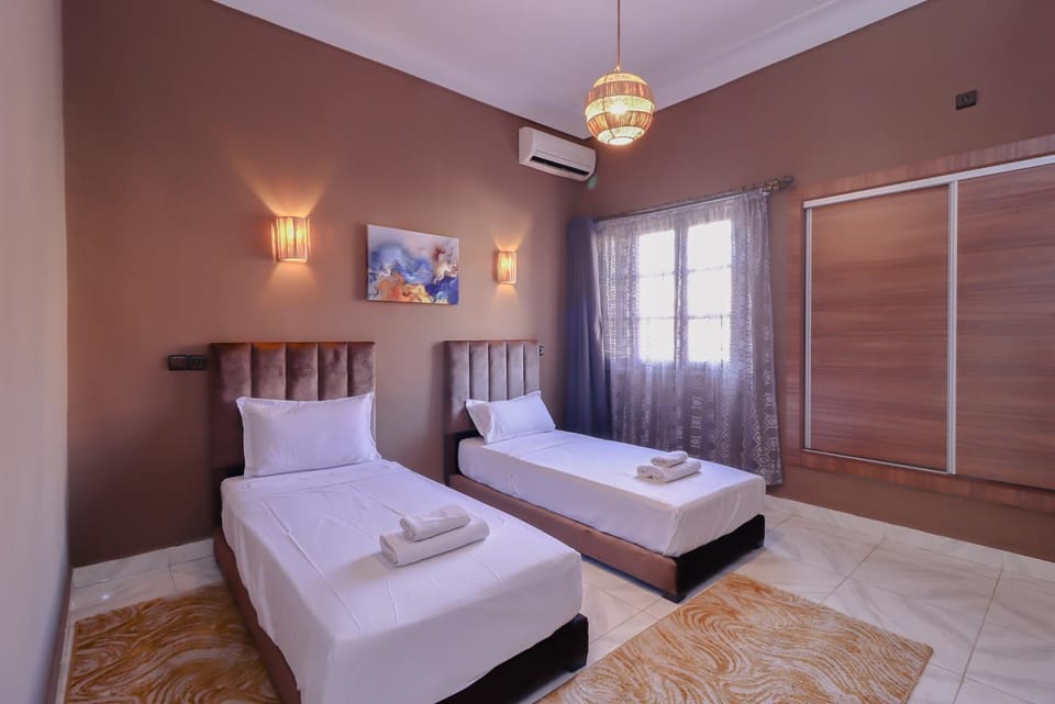 Bed, Photo of the whole room, Bedroom, towels, air conditioner