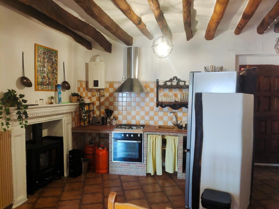 Kitchen or kitchenette, oven, stove, toaster