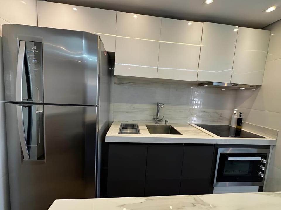 Kitchen or kitchenette, oven, stove