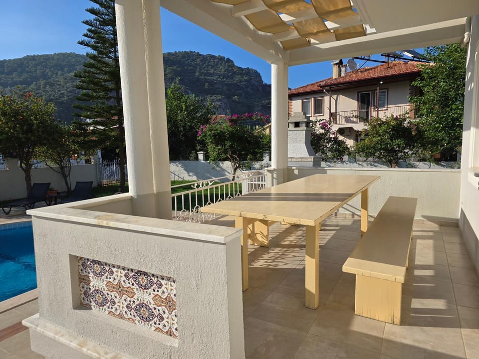 Property building, Seating area, Swimming pool