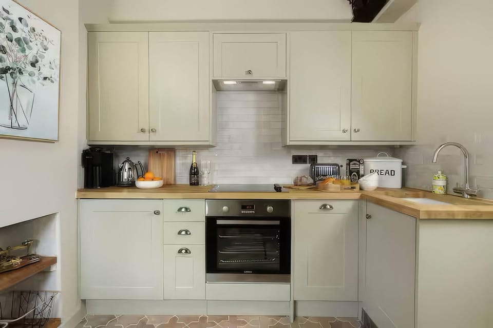 Kitchen or kitchenette, oven, stove