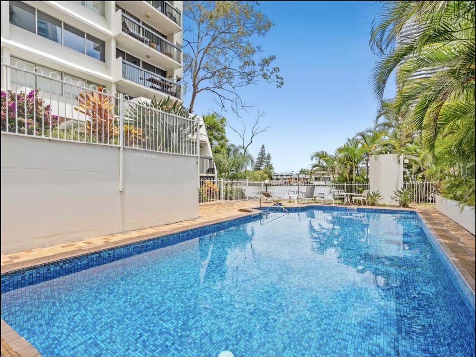 Property building, Day, Pool view, Swimming pool, sunbed