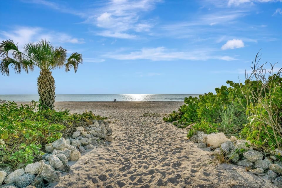 Beachfront with Private Balcony Heated Pool and Spa House in Holmes Beach