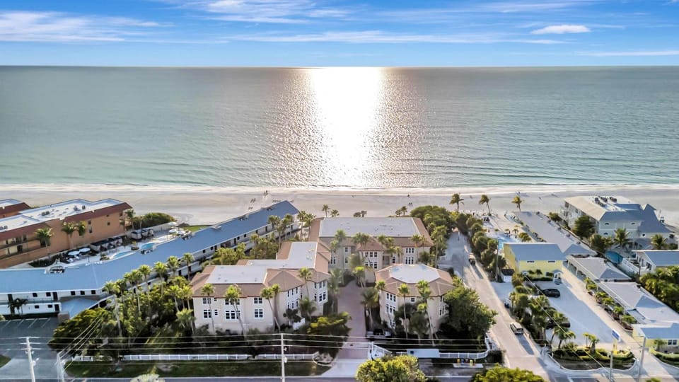 Beachfront with Private Balcony Heated Pool and Spa House in Holmes Beach