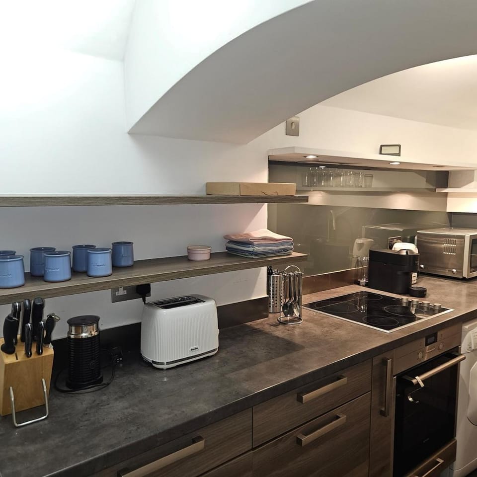 Kitchen or kitchenette, stove, toaster
