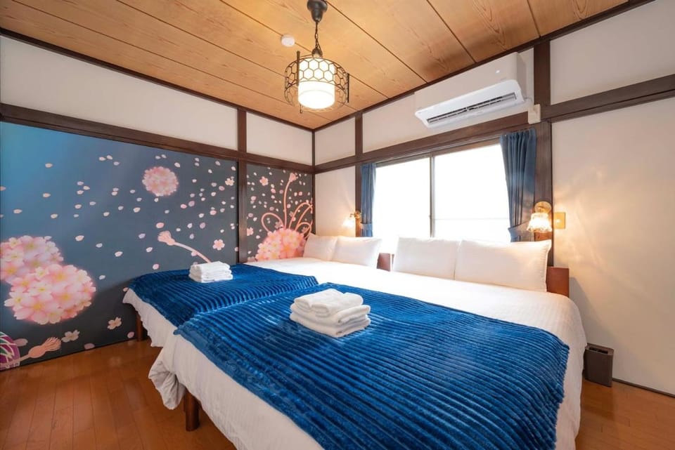 Bed, Photo of the whole room, Bedroom, towels, air conditioner