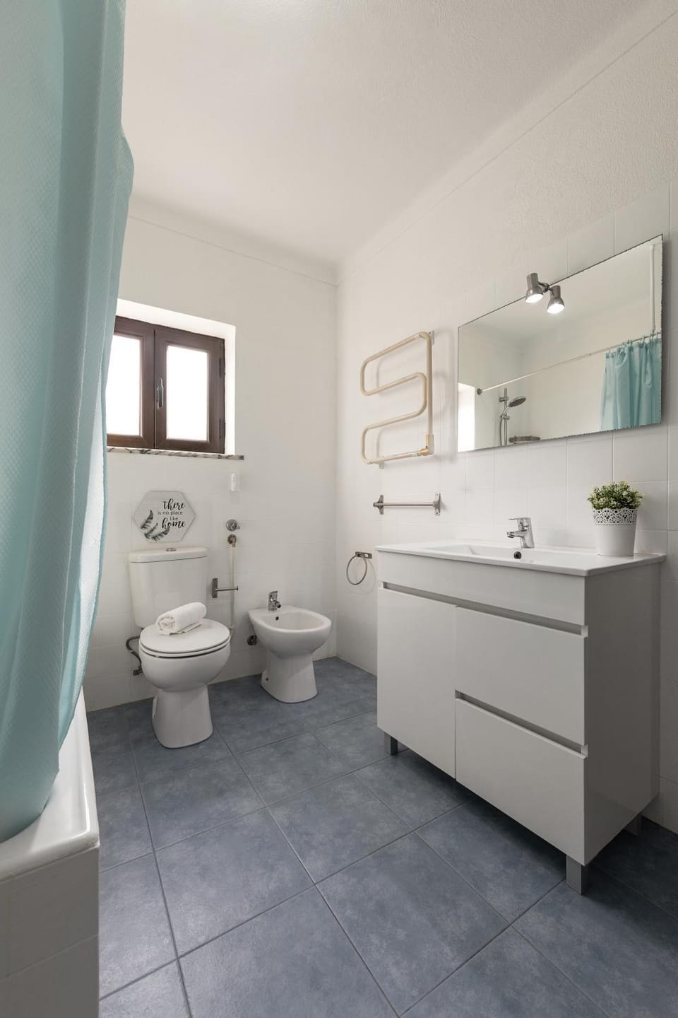 Bathroom, bidet, towels