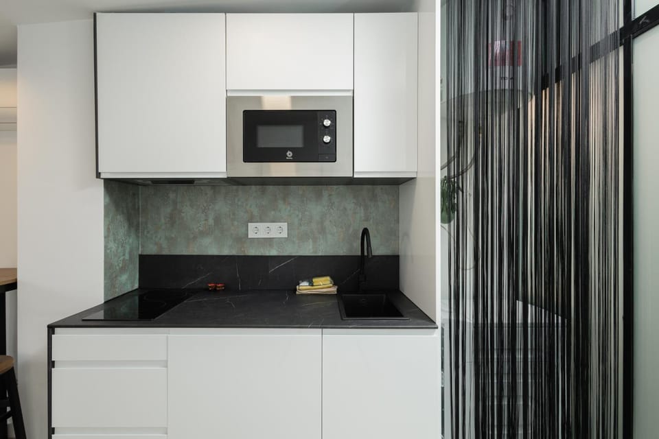 Kitchen or kitchenette, stove