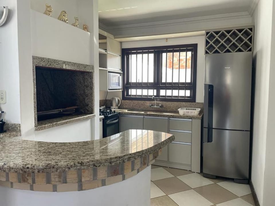 Kitchen or kitchenette, oven, stove