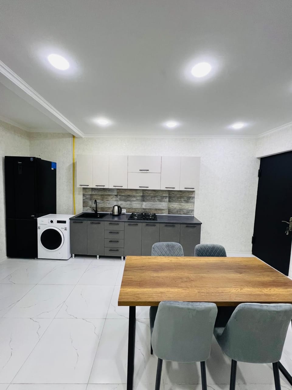 Kitchen or kitchenette, Dining area, dishwasher, minibar, toaster, washing machine, dryer