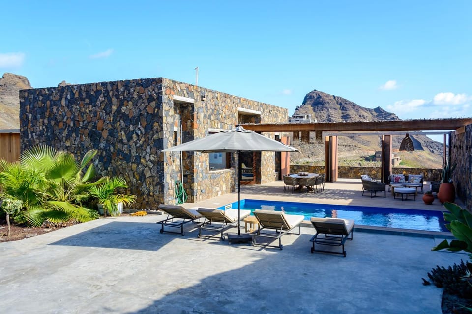Property building, Patio, Day, Natural landscape, Mountain view, Pool view, Swimming pool, sunbed