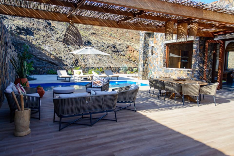 Patio, Day, Natural landscape, Seating area, Mountain view, Pool view, Swimming pool, sunbed