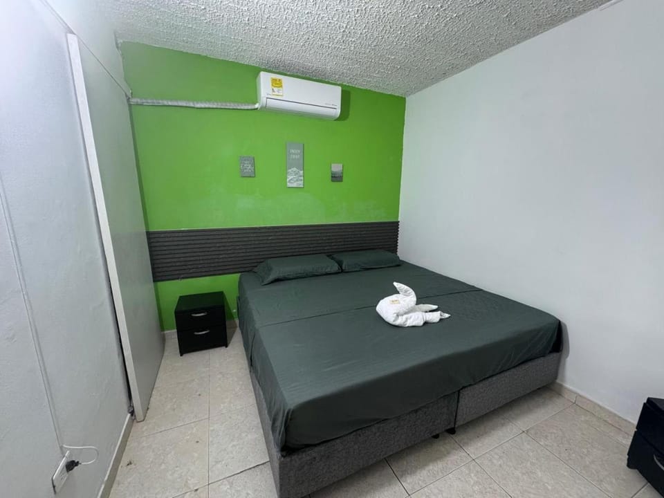 Bed, towels, air conditioner