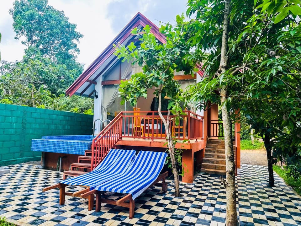 Property building, Patio, Spring, Day, Garden, View (from property/room), Balcony/Terrace, Garden view, sunbed
