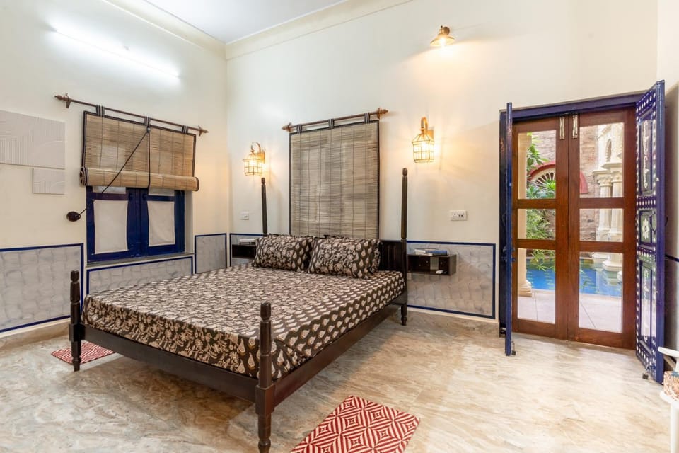 Bed, Living room, Seating area, Bedroom