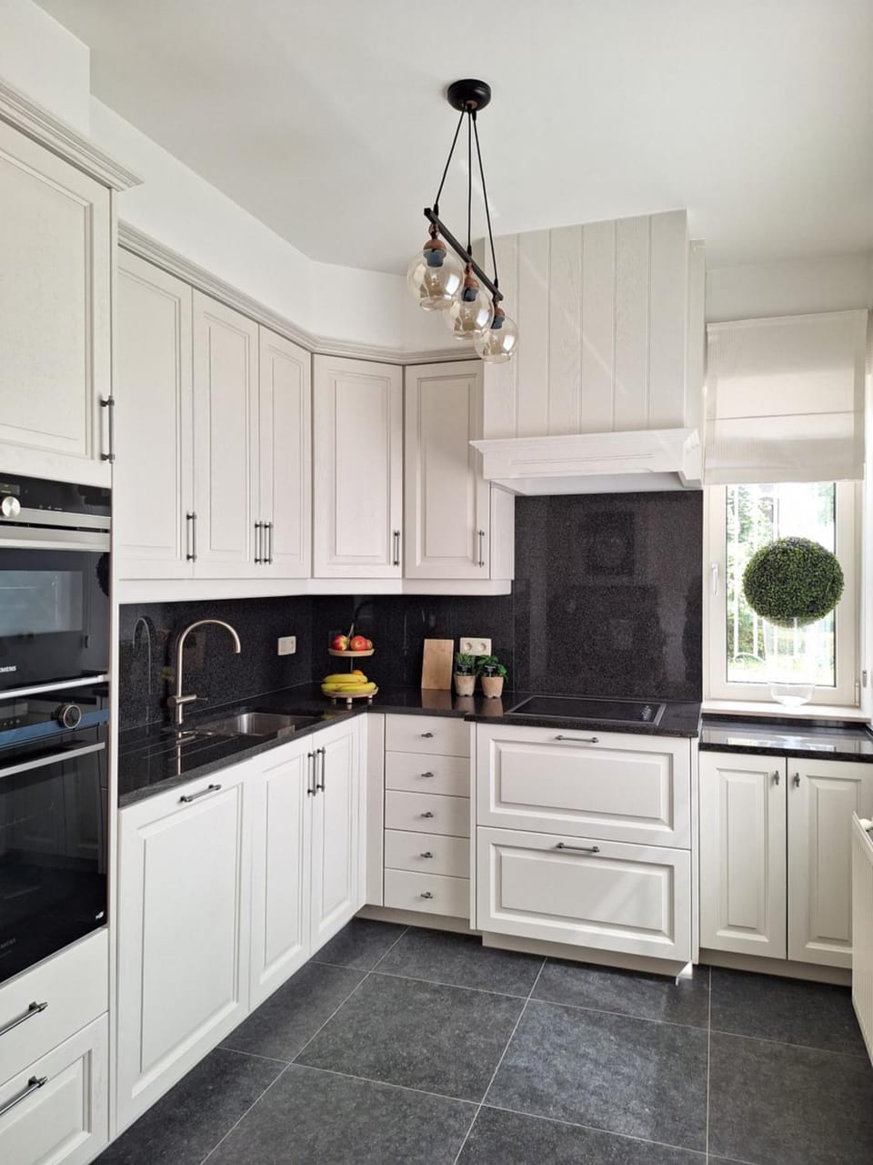 Kitchen or kitchenette, dishwasher, oven, stove