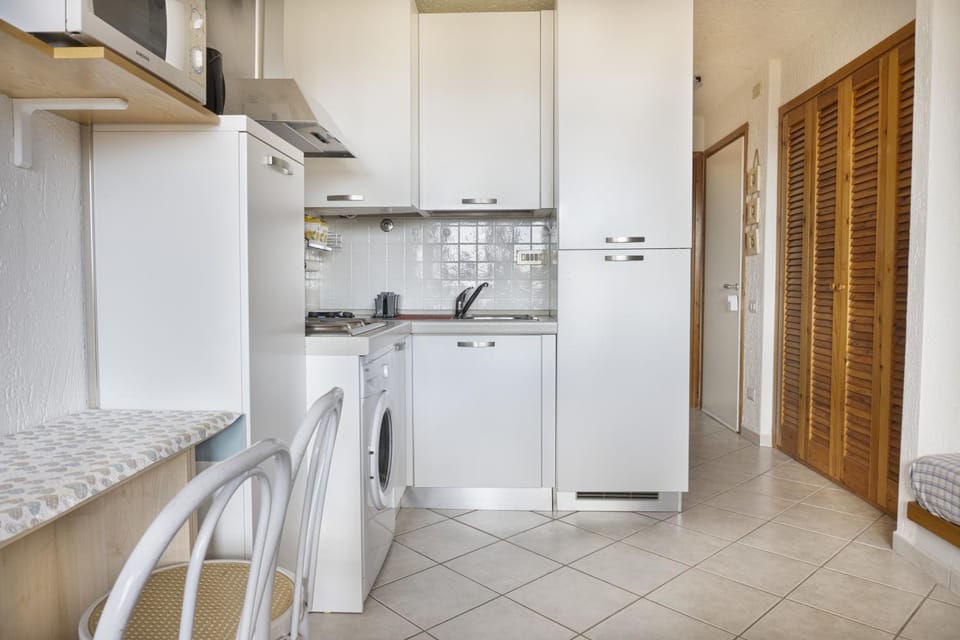 Kitchen or kitchenette, stove