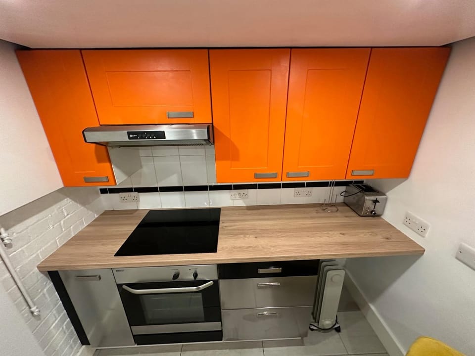 Kitchen or kitchenette, stove