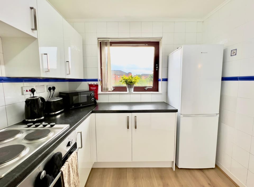 Kitchen or kitchenette, oven, stove