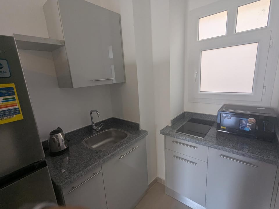 Kitchen or kitchenette, microwave